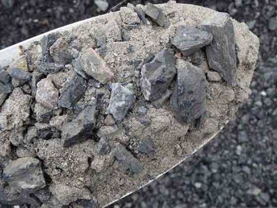 Crusher run gravel on a shovel, delivered in Maryland and Virginia